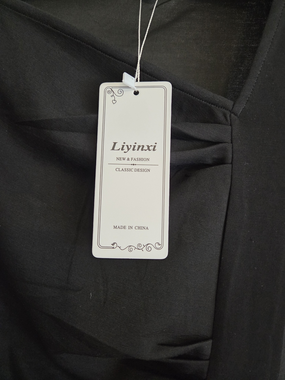 Black Cap-Sleeve Wrap Sheath Dress - Picture 6 of 6